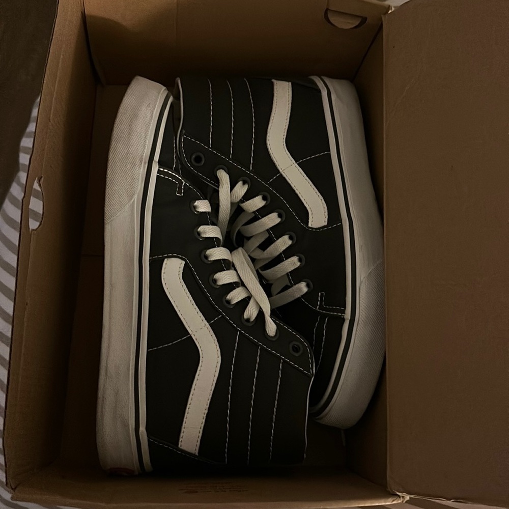 Dark gray high top Vans